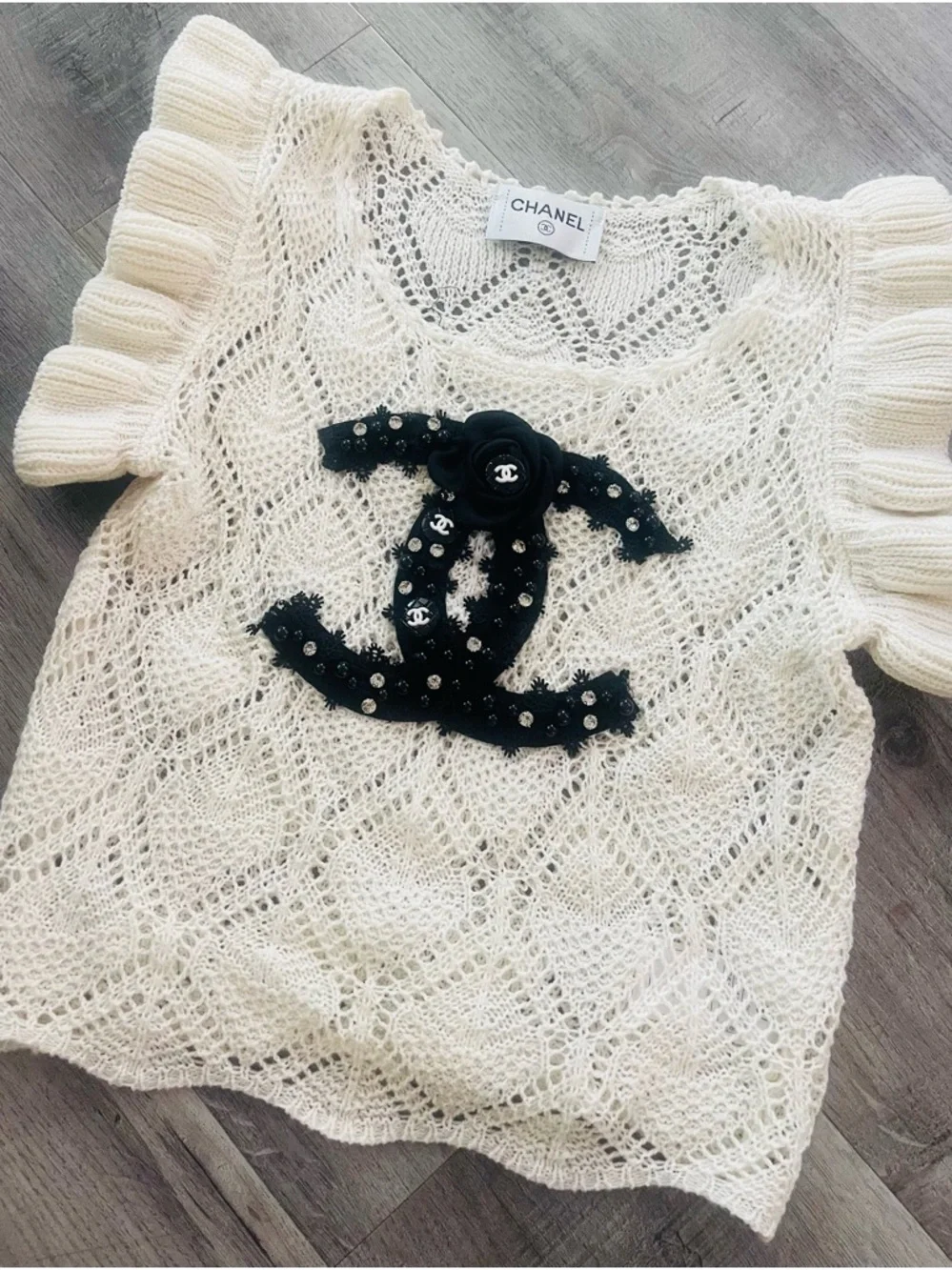 CHANEL Cream Openwork Knit Top with Black CC Appliqué SIZE S